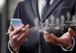 businessman-shows-his-hands-hologram-human-resources-blurred-background_1035553-203