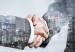 double-exposure-business-partnership-handshake-modern-city-successful-business-greeting-agreement-after-perfect-deal_39665-134